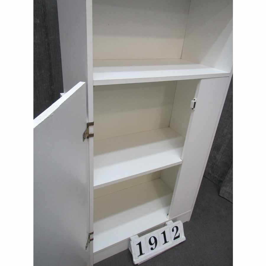 A1912  Storage cabinet with shelves.