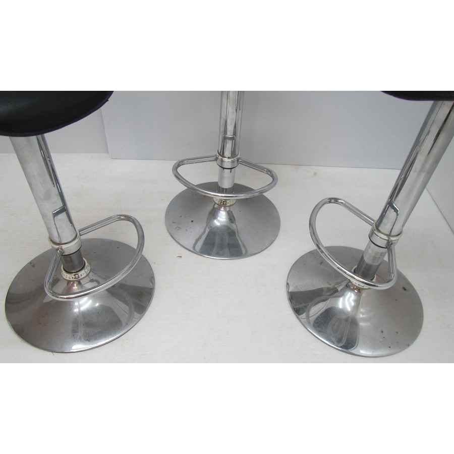 A1950  Set of three gas lift swivel stools.
