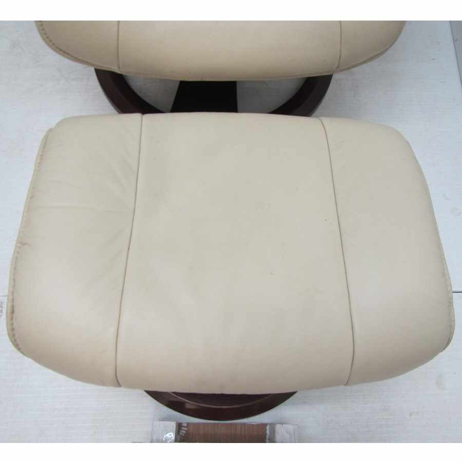 AG125  Leather recliner armchair with footstool.