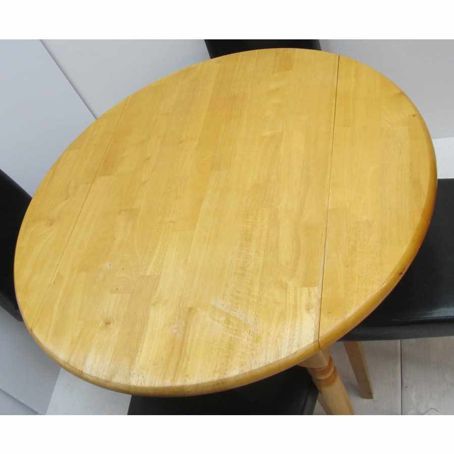 Drop leaf table and 4 chairs.