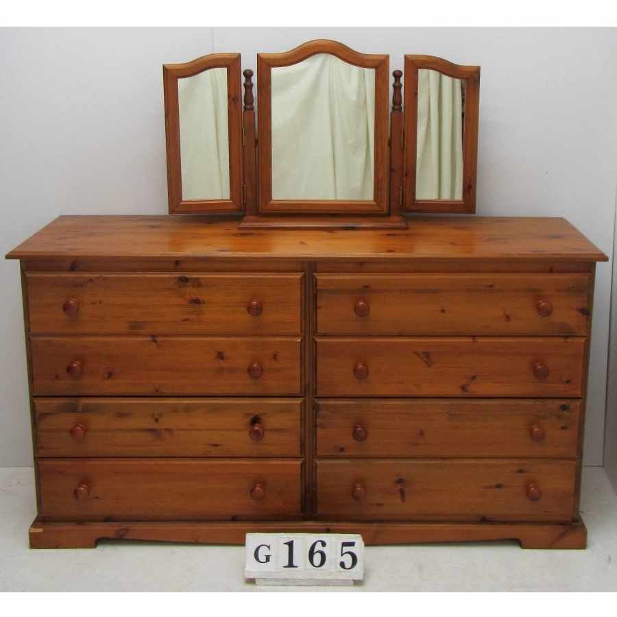 Large chest of drawers with mirror.