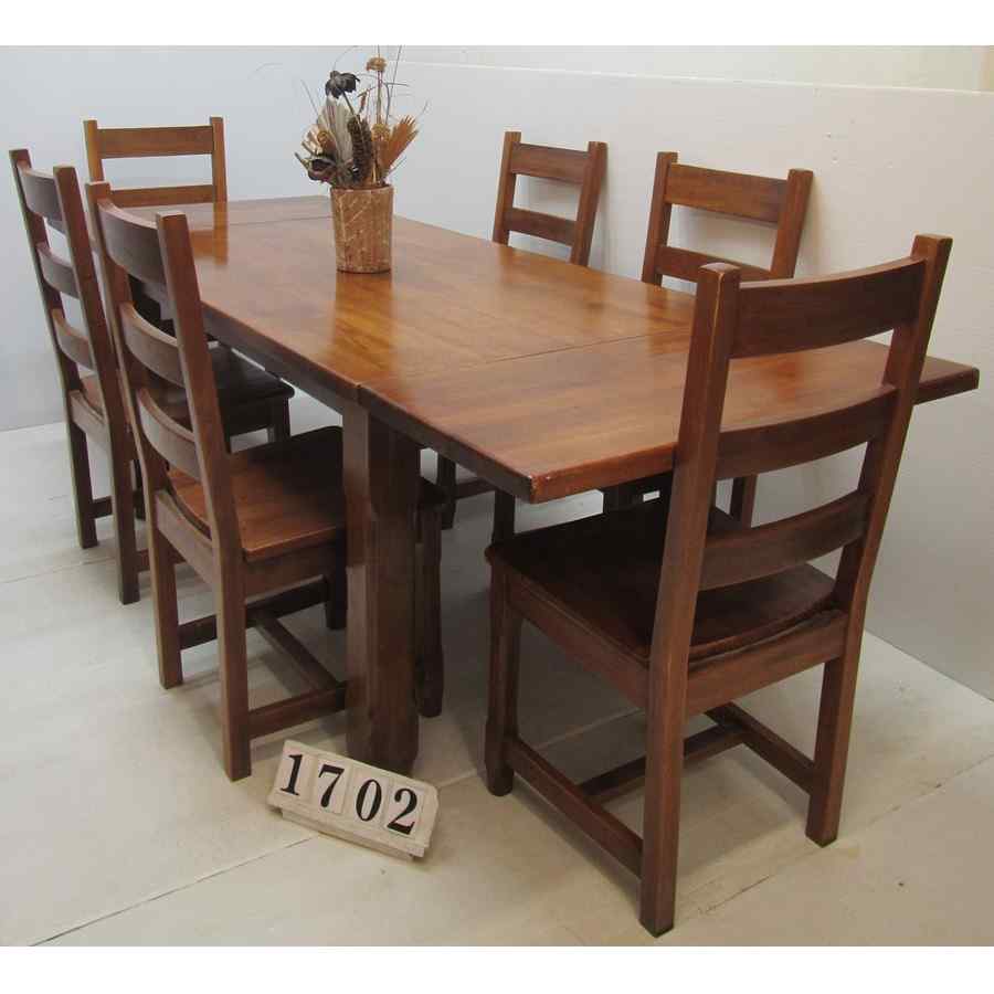 Solid wood table and 6 chairs.