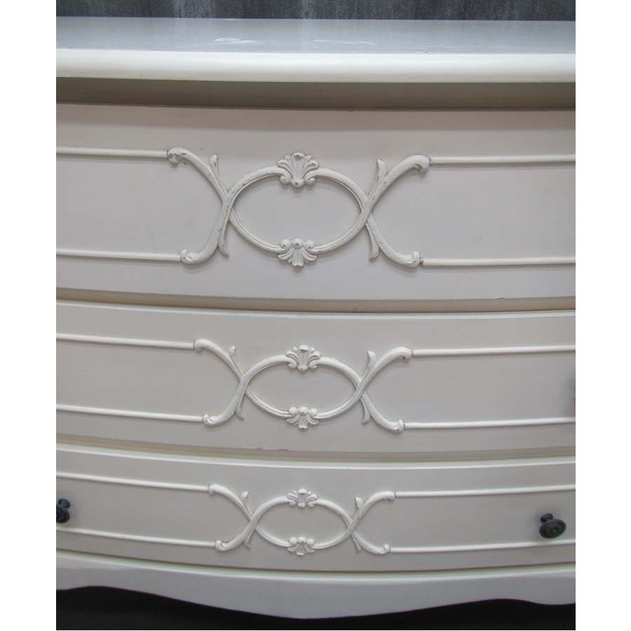 Cream French style chest of drawers.