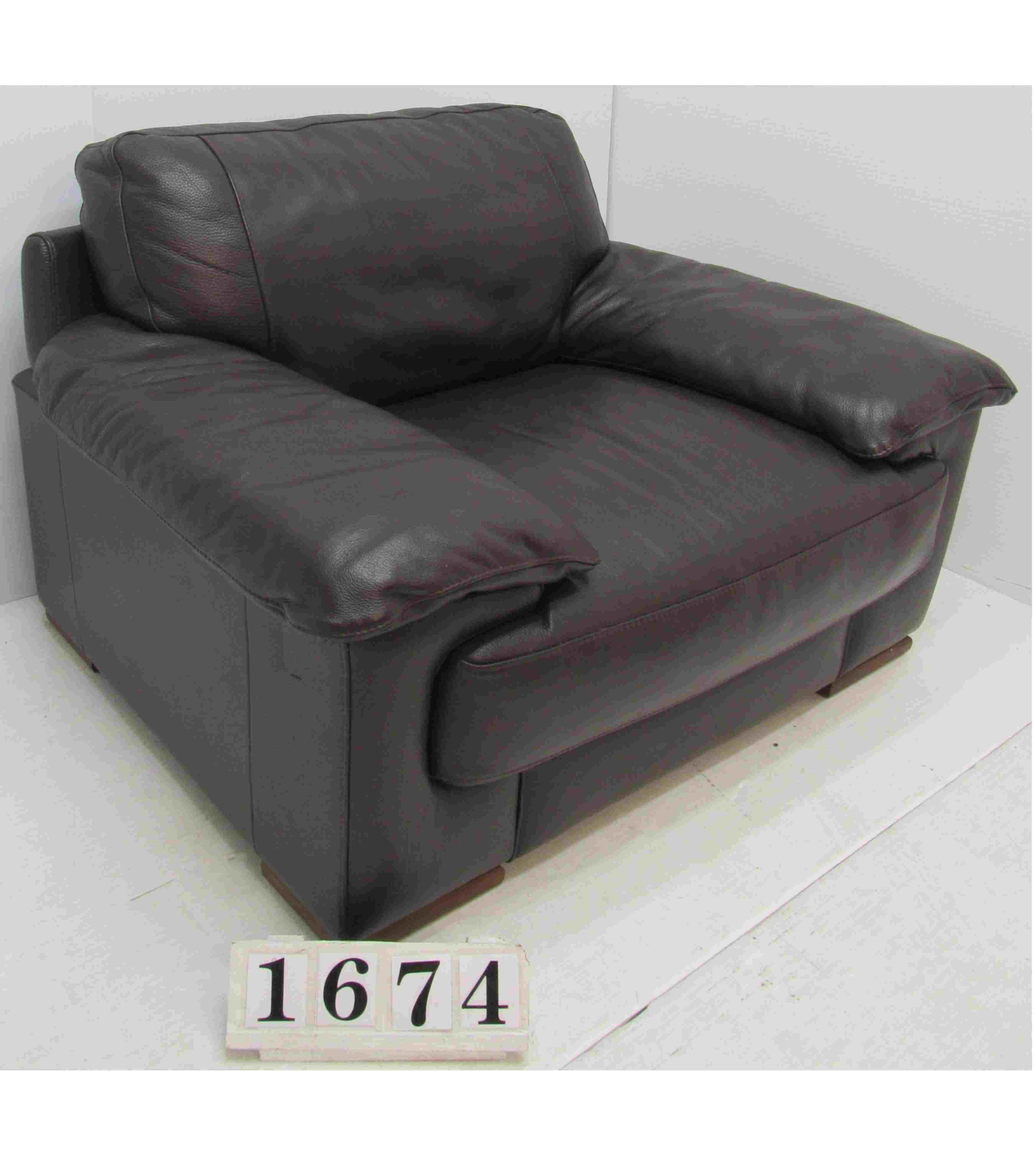 Large brown leather armchair.
