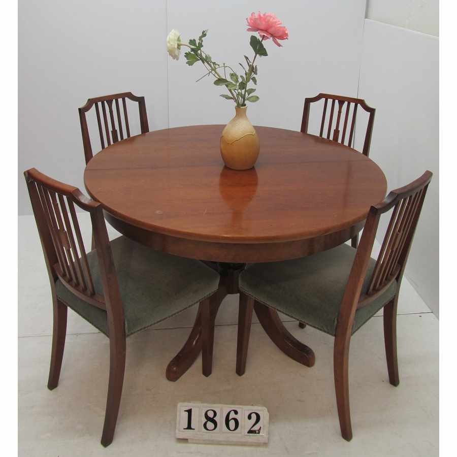 Three way extending table and 4 chairs.