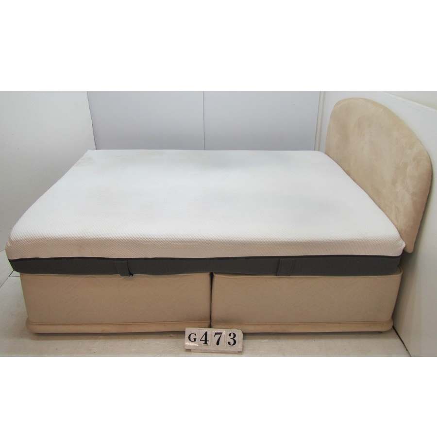 Kingsize bed with headboard and mattress.