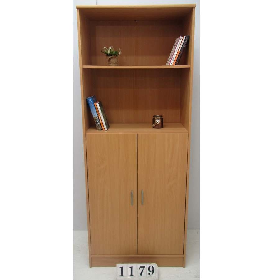 A1179  Shelving unit with bottom doors.