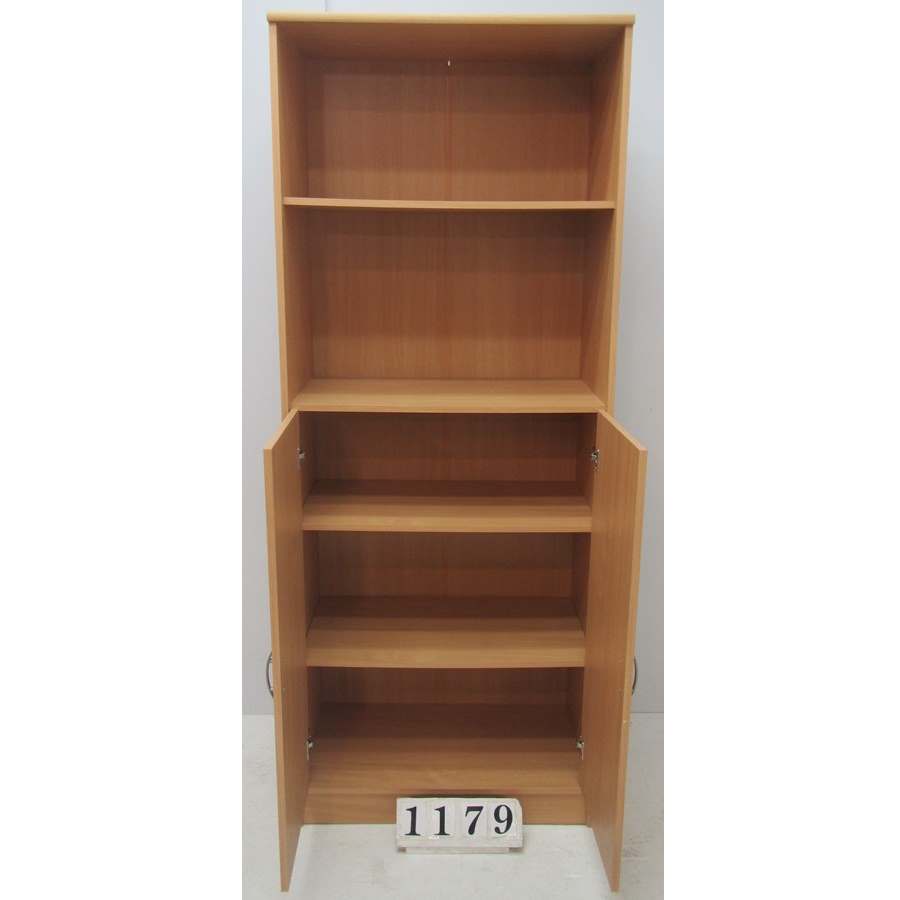 A1179  Shelving unit with bottom doors.