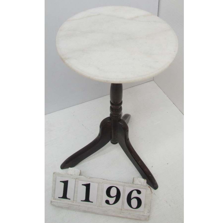 Plant stand with marble top.