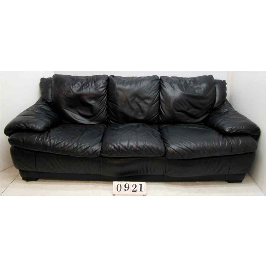 Large black leather three seater sofa.