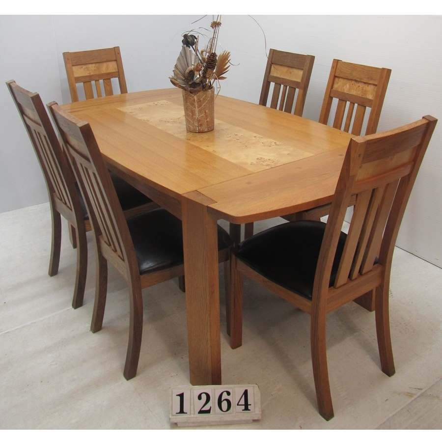 Oak table and 6 chairs.