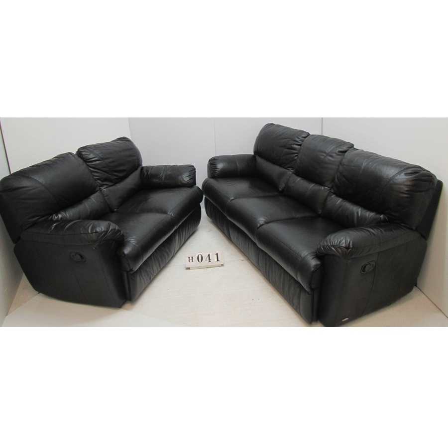 AH041  Black leather recliner two piece suite.