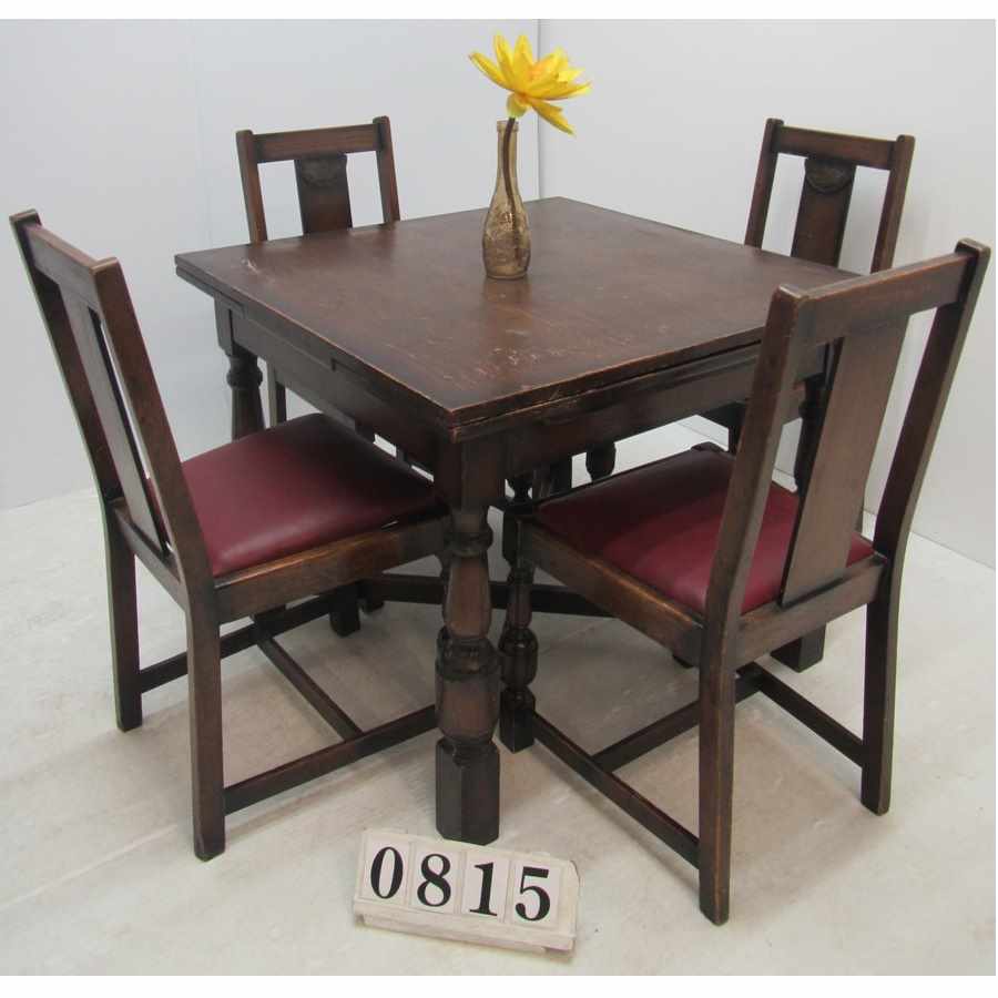 Antique extending table and 4 chairs.