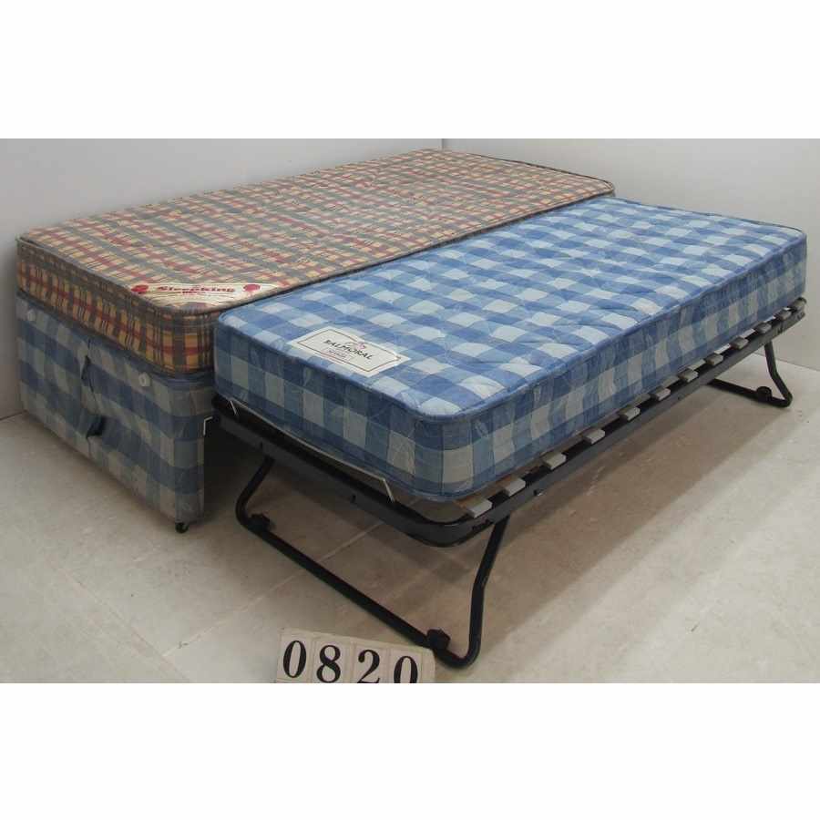 Budget trundle bed with mattresses.