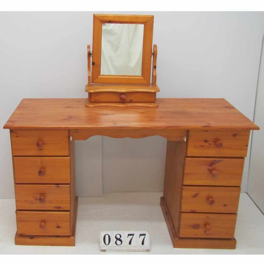 Dressing table with  drawers and mirror.