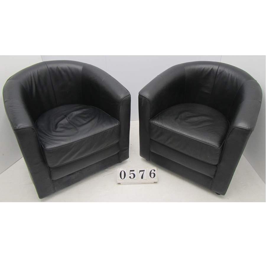 A0576  Pair of black leather tub chairs.
