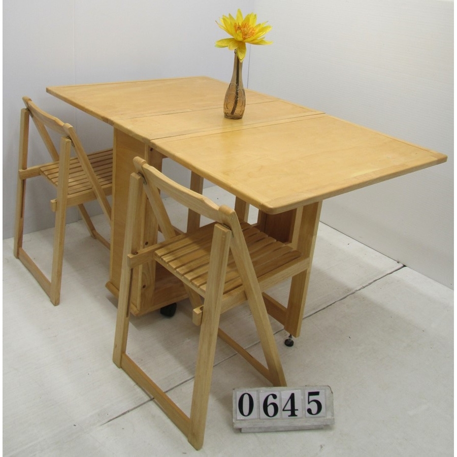 Stowaway  drop leaf table and 2 chairs.
