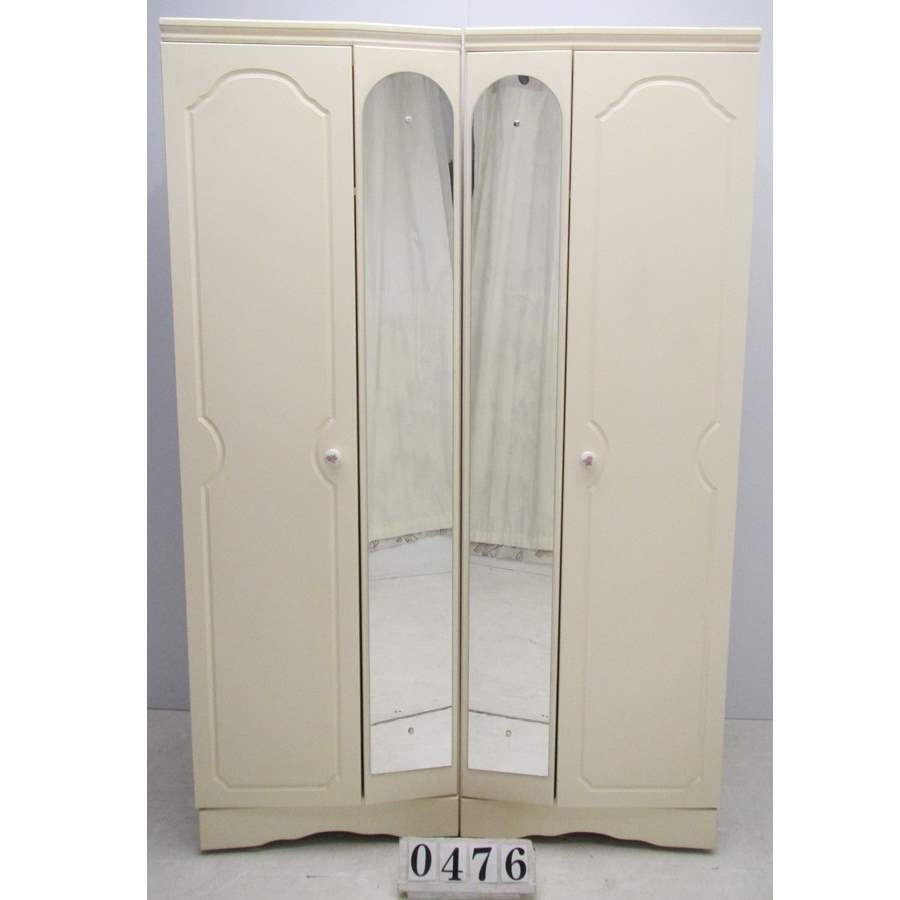 Two piece wardrobe with mirrors.