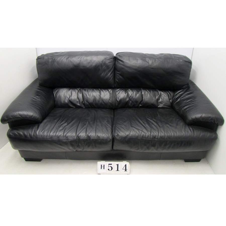Large black leather sofa.