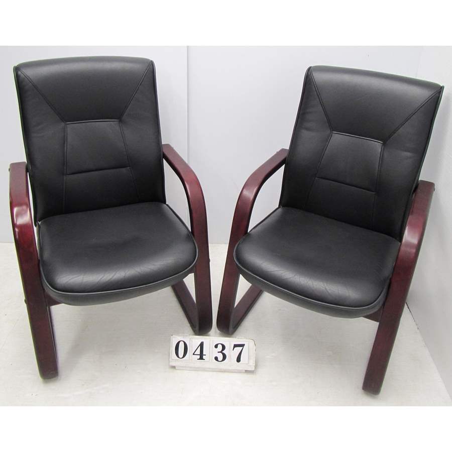 Pair of black PU lazy chairs.