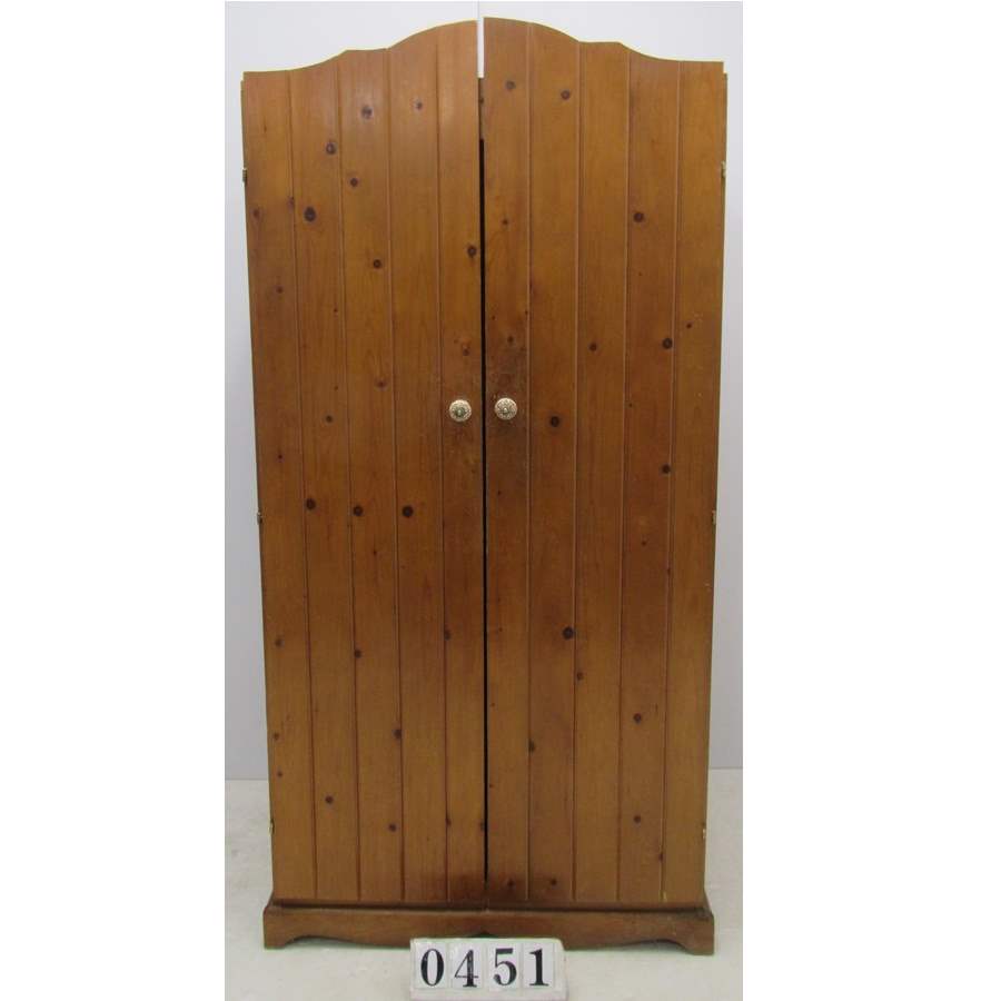 A0451  Solid pine wardrobe.