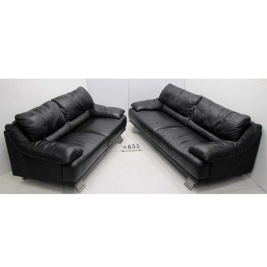 Beautiful black leather two piece suite.