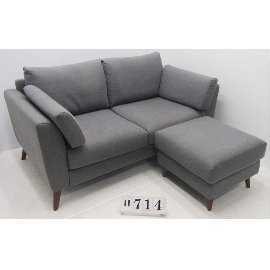 Nice two seater grey sofa with footstool.